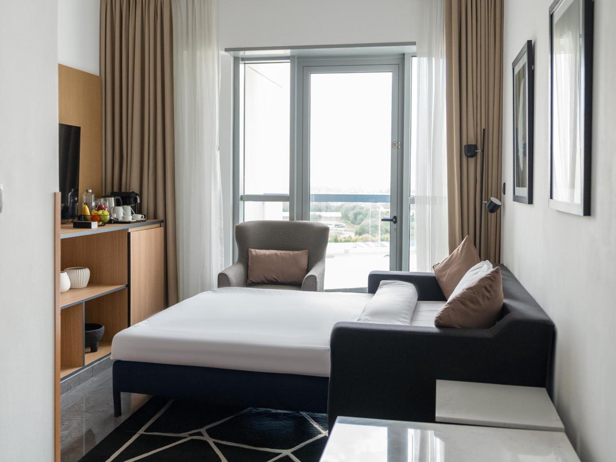 فندق The First Collection Business Bay 4*